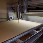 CNC Router Drilling Mounting Holes for Spoil Board